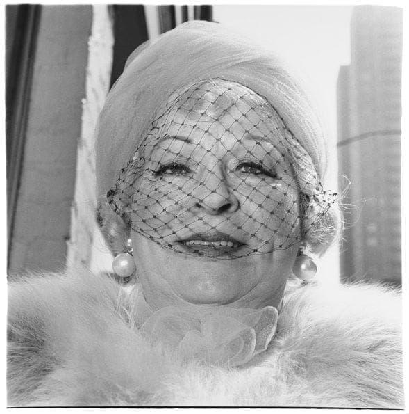 woman with a veil on fifth avenue nyc 1968 c the estate of diane arbus